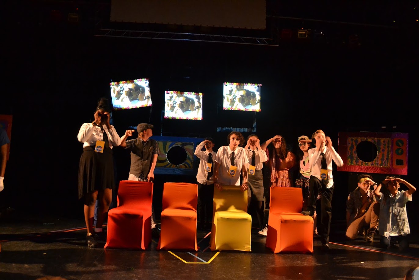 Large Group of Young people in a theatre performance