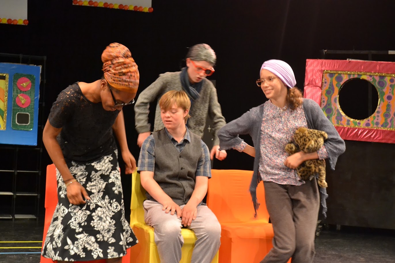 Young people in a theatre performance