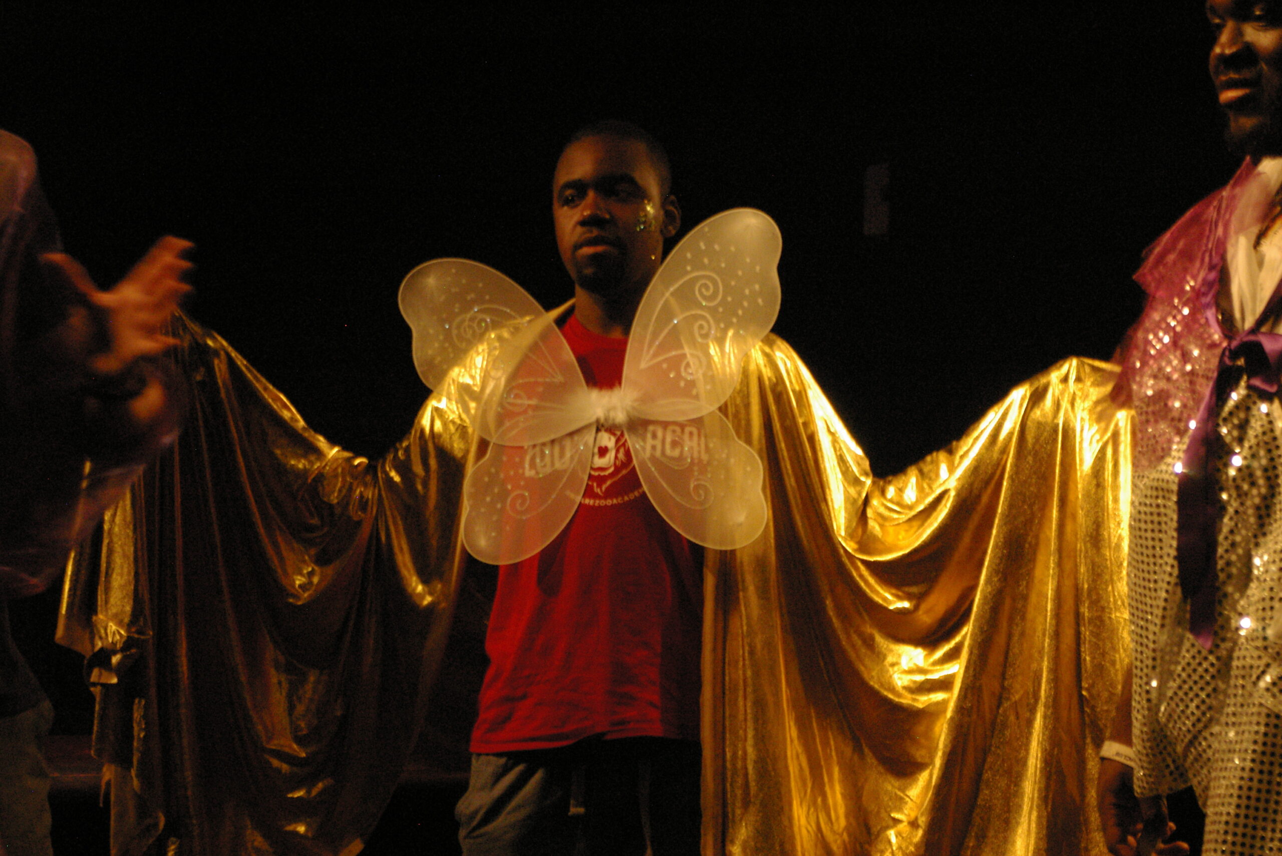 Young People performing in a theatre