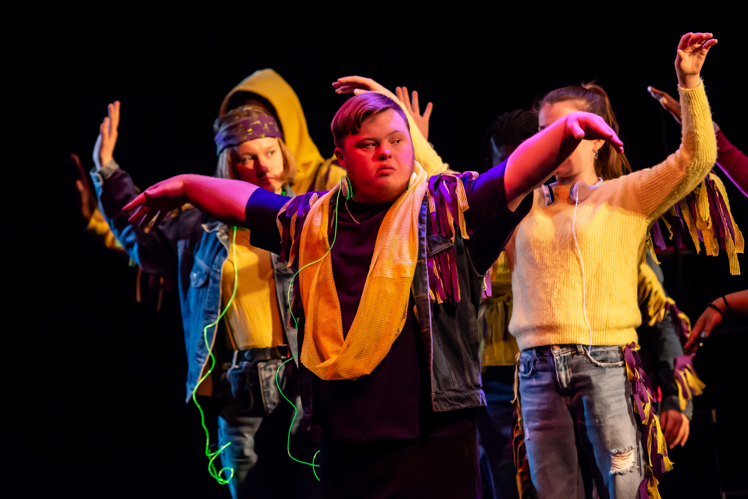 Group of Children performing in a theatre