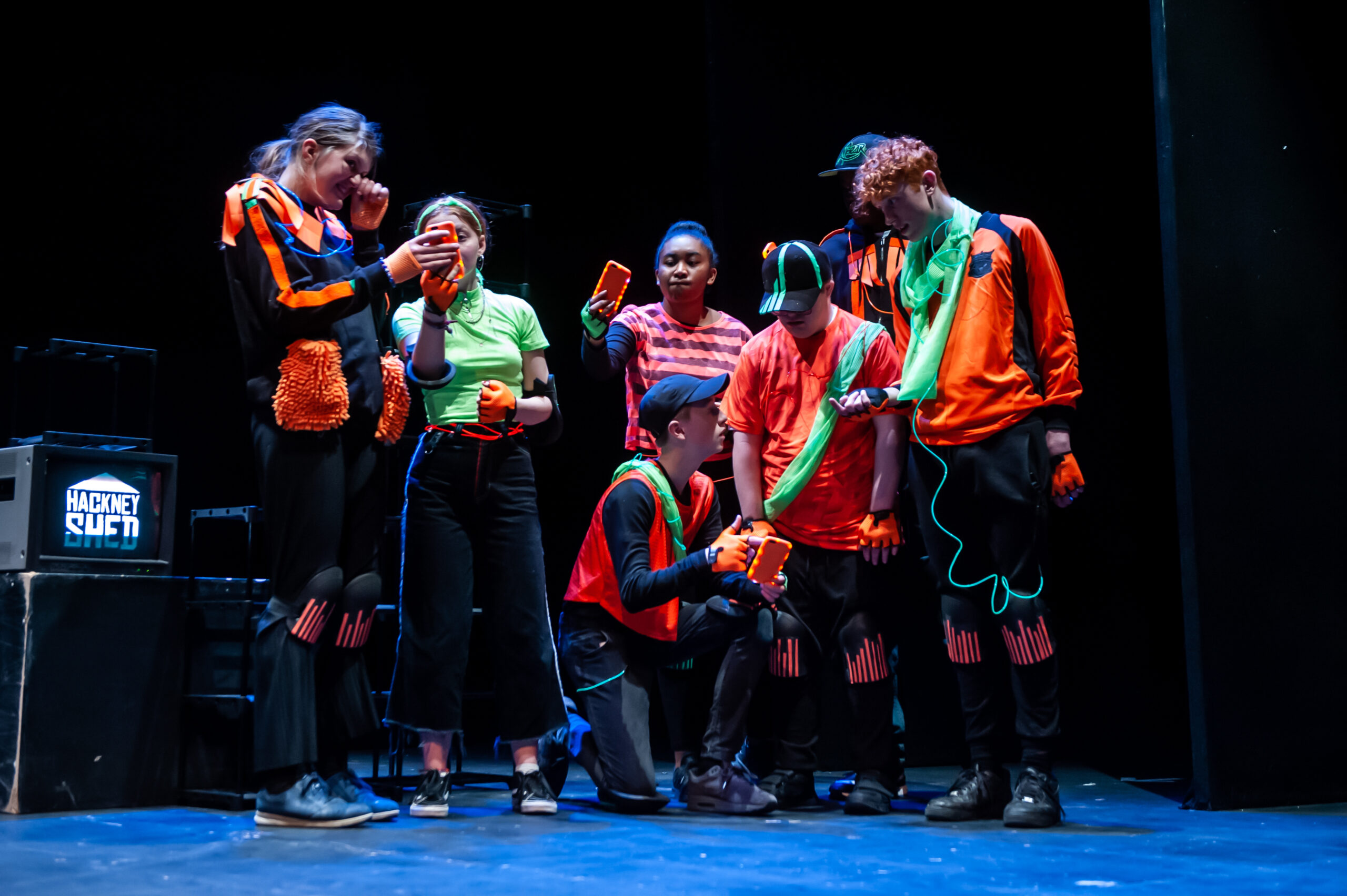 Group of Children performing in a theatre